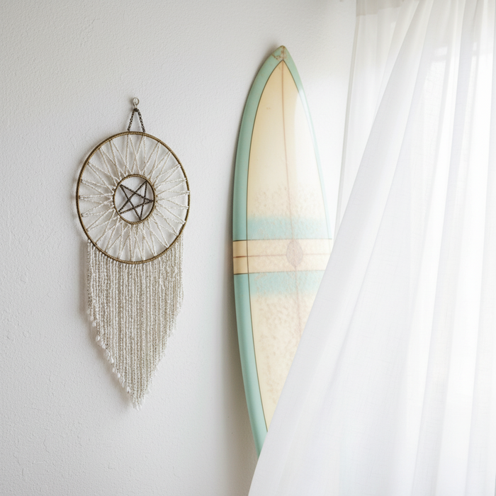 Handmade Balinese shell dream catcher wall hanging with pentacle centre. 33cm diameter, 80cm long. Perfect for coastal, boho, and beach home decor.
