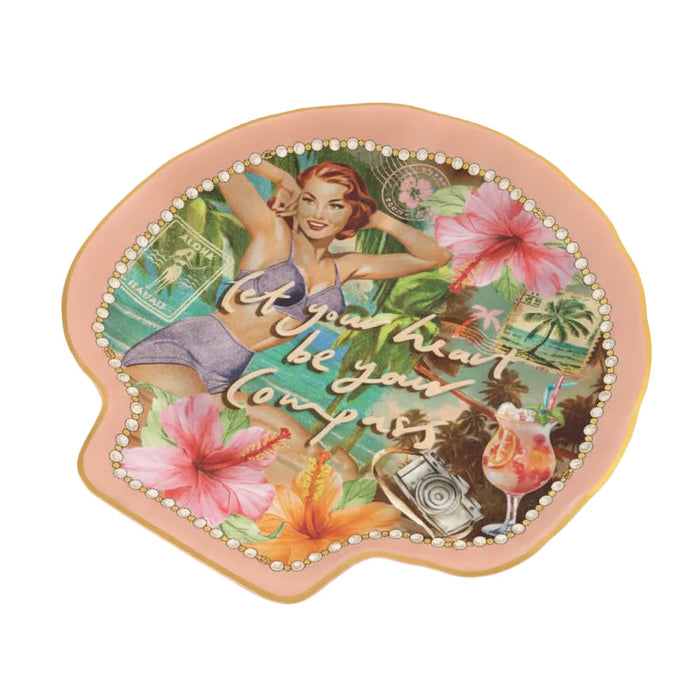 Decorative trinket tray catch all plate with a vintage-style design featuring a woman, tropical flowers, and travel-themed elements.