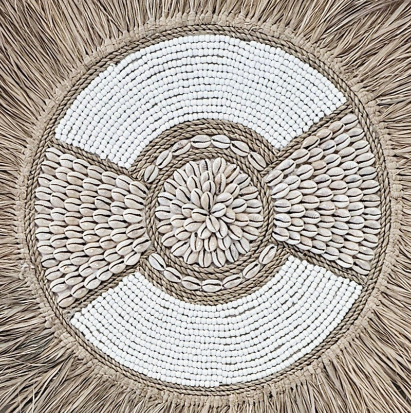 Seagrass and shell round wall hanging
