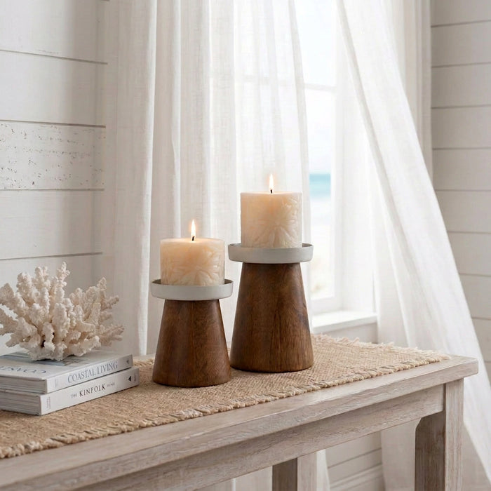 Add coastal charm with the Beachcomber set of 2 acacia wood candle holders, featuring natural timber grain and matte white metal tops.