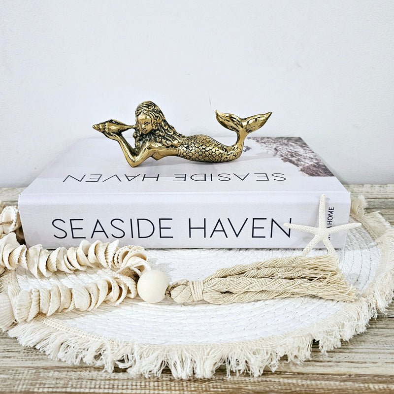 Brass mermaid figurine statue