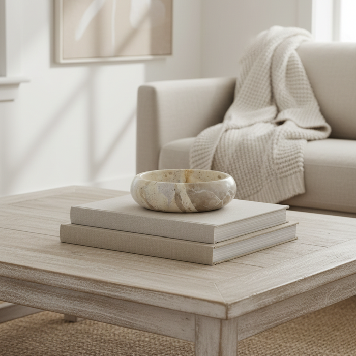 The Bronte Marble Bowl is crafted from premium taupe and sand-hued natural marble with unique veining. A stylish 12 x 5 cm piece for serving or décor styling.