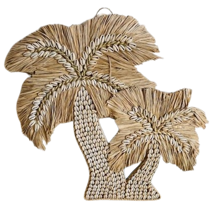 Decorative palm tree wall art made of natural materials on a white background