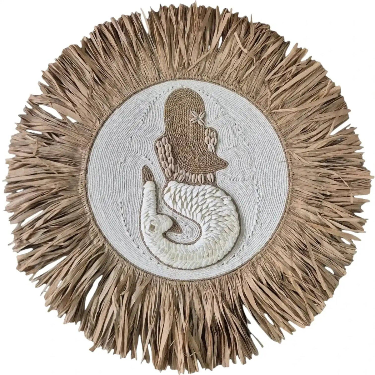 Discover the Indie Shell Mermaid & Raffia Wall Hanging, handcrafted in Bali with natural shells, cotton rope and raffia. A statement piece for boho coastal homes.