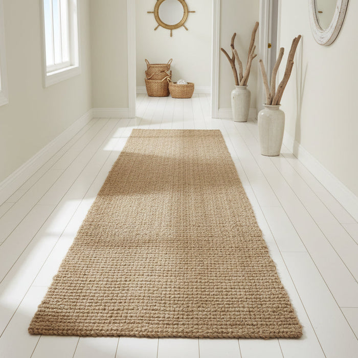 Heavy duty coastal jute rug made from natural fibers for beach house and Boho interiors