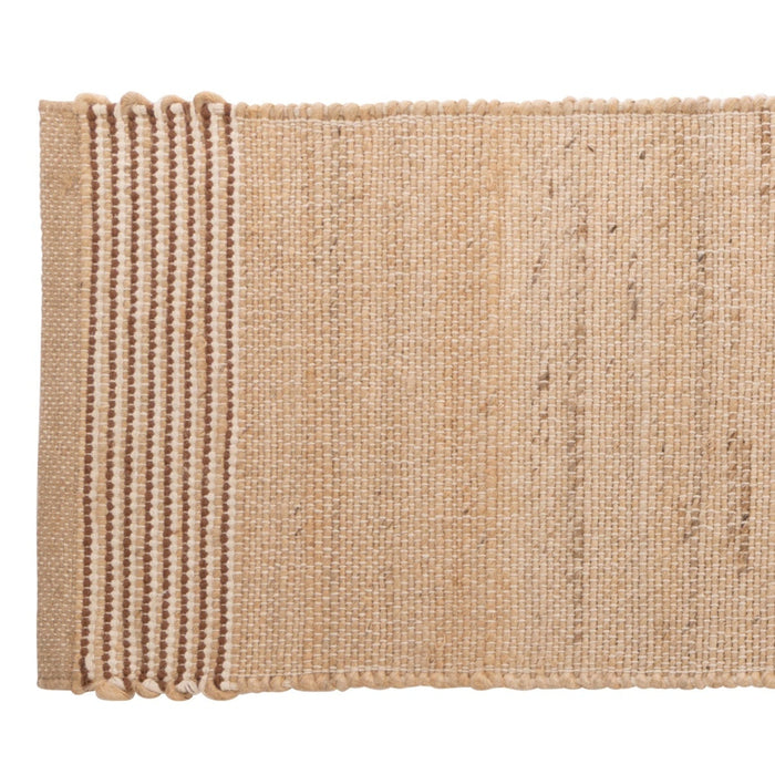 Marle Table Runner in natural jute, styled on a wooden table with boho décor, candles, ceramics, and woven placemats