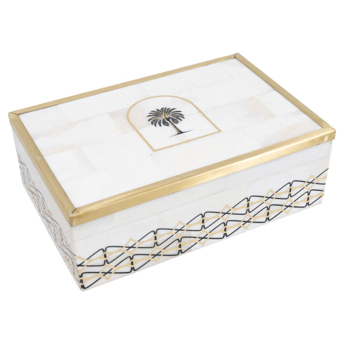 Decorative box with gold trim and palm tree design on a white background