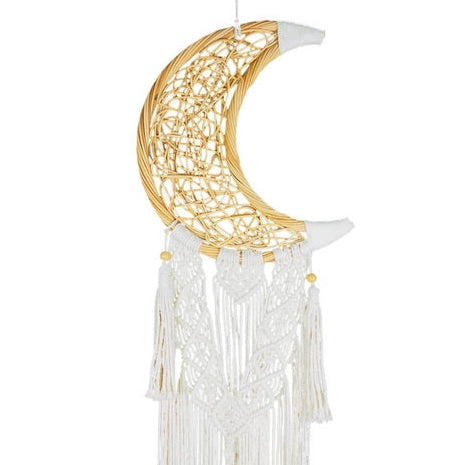 Decorative moon-shaped wall hanging with tassels on a white background