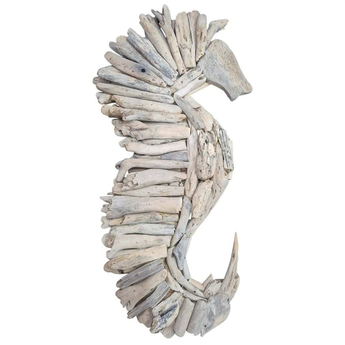 Handcrafted in Indonesia, the Seabreeze Driftwood Seahorse Wall Hanging adds natural texture and relaxed coastal charm to beach houses and coastal homes.