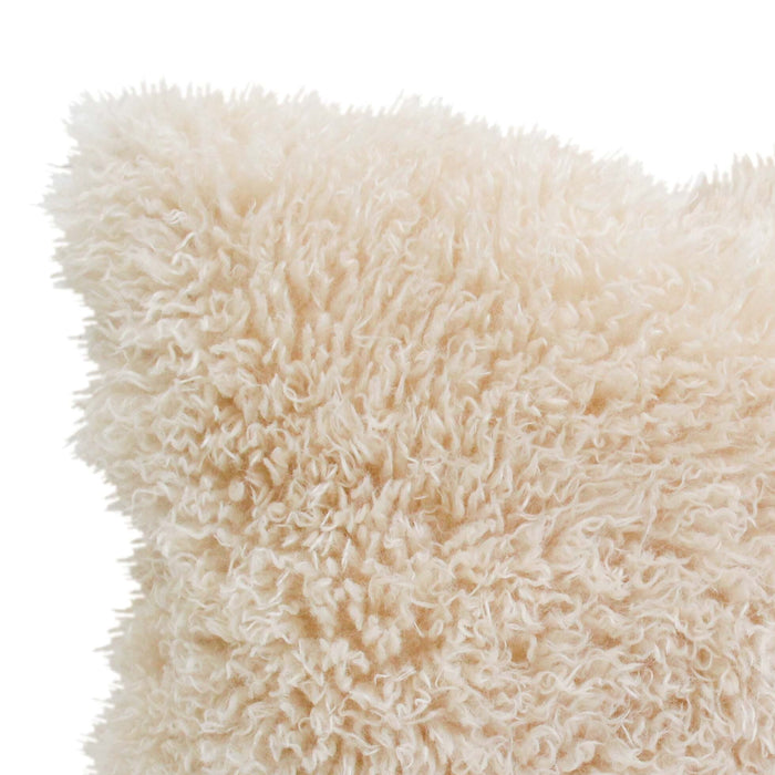 Wanderluxe Shaggy Cushion.