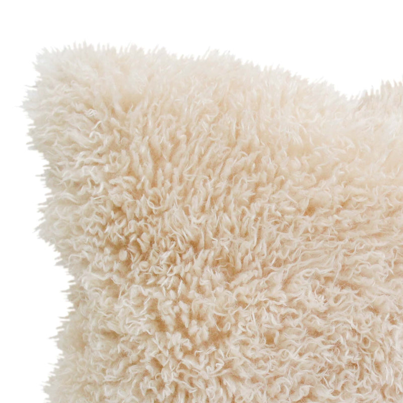 Wanderluxe Shaggy Cushion.