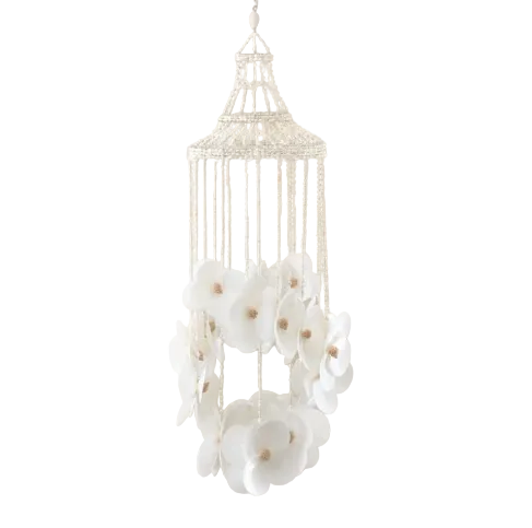 Discover the Fleur Shell Chandelier Wind Chime, handmade in Bali from scallop shells arranged into a beautiful flower design. 65cm long.
