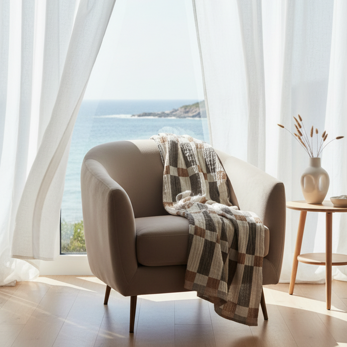 Style your home with the Sienna Textured Throw, crafted from soft recycled cotton with an elegant geometric design in sienna, white, and taupe. Perfect for beds, sofas, and coastal inspired interiors.